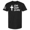 Black t-shirt with white brushstroke cross graphic and “God Guts Glory” script
