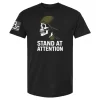 Black t-shirt featuring a skull wearing a drill instructor helmet in profile and the text “Stand at Attention” underneath