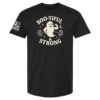 Black t-shirt with ghost lifting barbells and the words “Boo-tiful & Strong” in cream lettering
